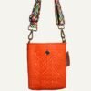 Handmade crossbody bag crafted from high-quality recycled plastic.