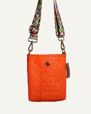 Handmade crossbody bag crafted from high-quality recycled plastic.